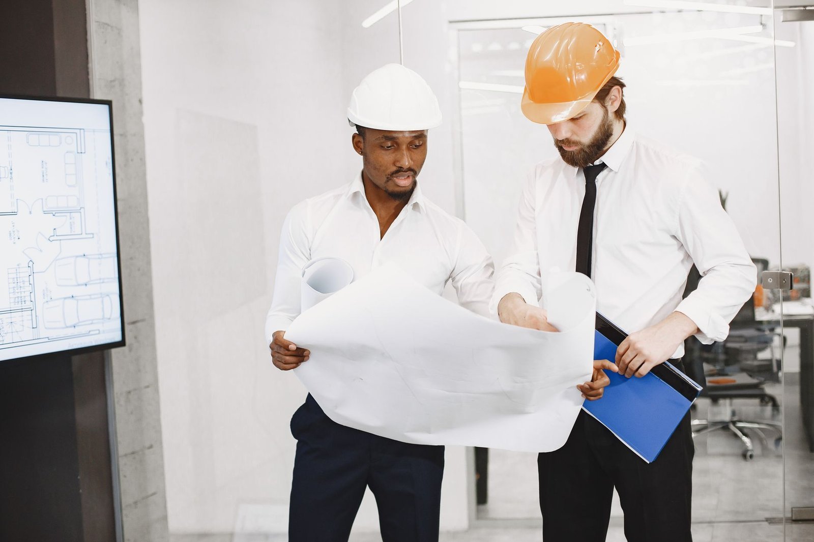 architects looking at blueprint